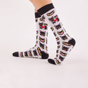 Calcetines Xoan Viqueira - peSeta, negras y blancas con estampado de perritos , accesorios funcionales, materiales sostenibles