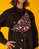 bolso-riñonera lux con cierre delantero, cinta regulable, estampado original de luces en movimiento colorido,  moda lentita, moda española, marca unisex