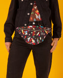 bolso-riñonera lux con cierre delantero, cinta regulable, estampado original de luces en movimiento colorido,  moda lentita, moda española, marca unisex