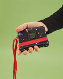 Tarjetero monedero Espacial PET - peSeta, Carteras ecológicas originales, con diseño original del espacio y las constelaciones y un cordón rojo para llevar, cinta elástica de cierre, Diseño textil en Madrid, moda lentita, moda unisex