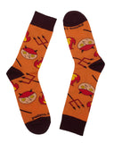 calcetines-kike-ibanez, color naranja y negro, estampado divertido diablito y tridente. moda lentita, moda española
