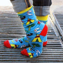 Calcetines azules Marina Molares, diseños divertidos azul rojo y amarillos, dibujos hamburguesa, calavera, cactus, guitarra, moda original, estampados originales tallas reales, ropa favorecedora